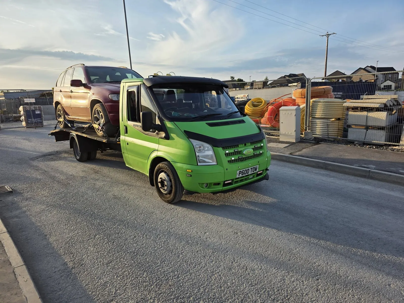 MG Autos recovery truck carrying a vehicle